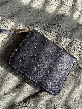 Brand new black embossed wallet